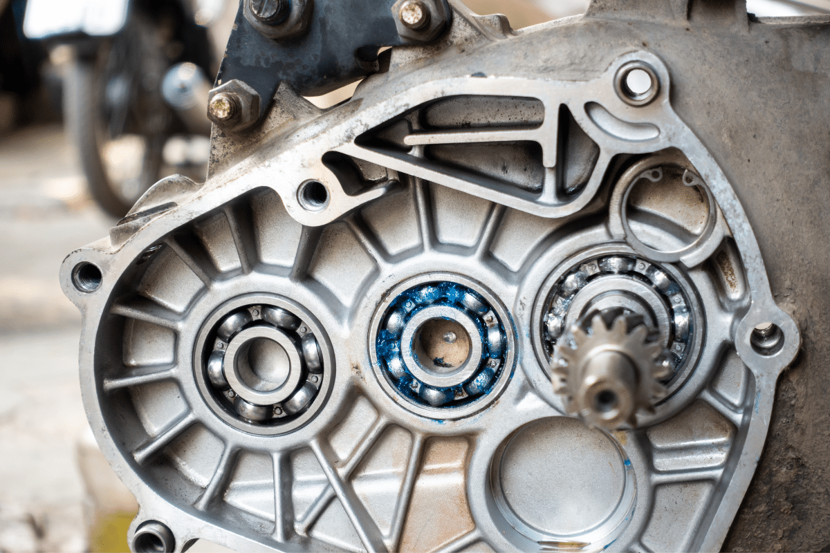 Three types of bearings are used in motorcycle transmissions to reduce friction.
